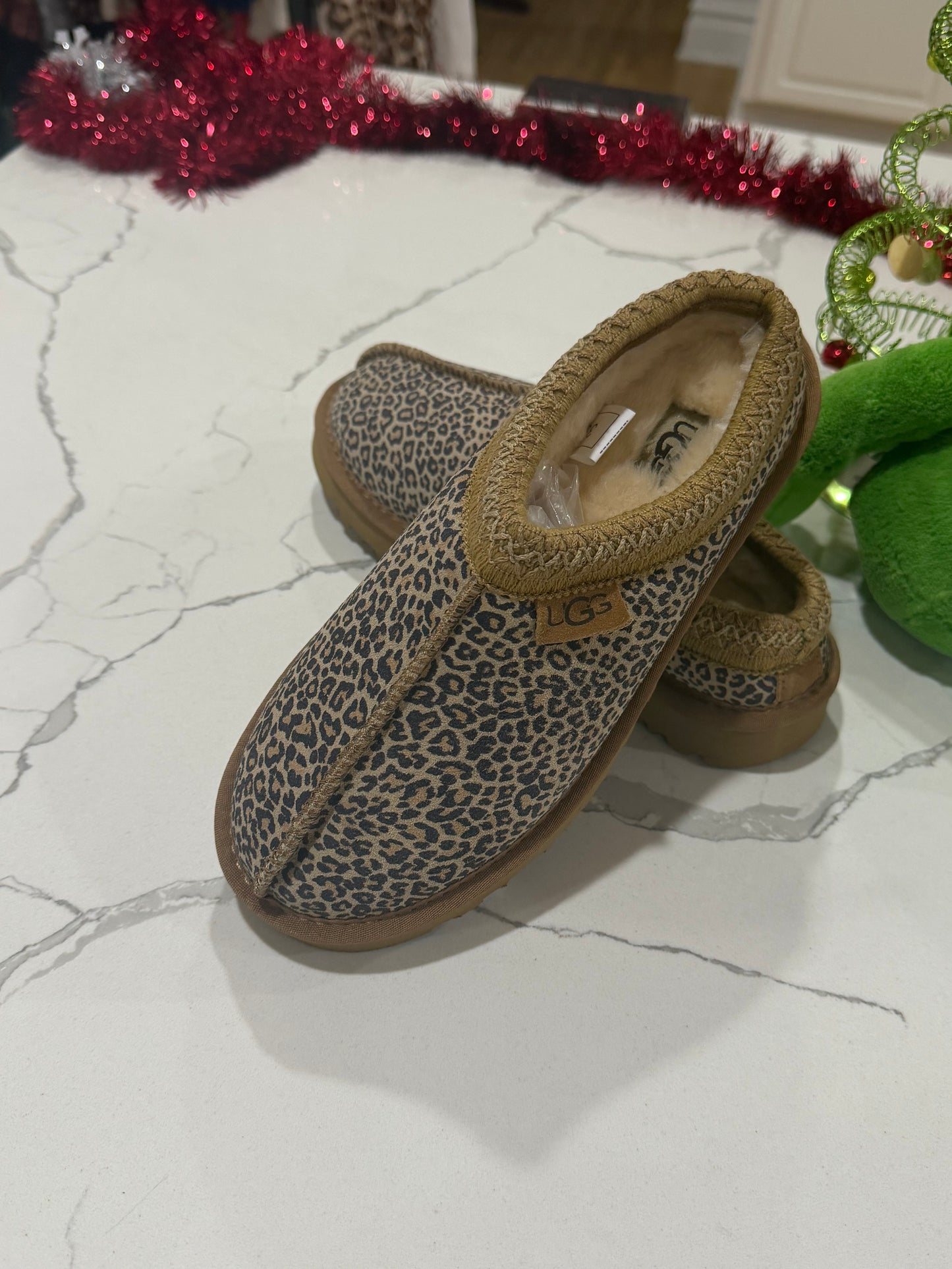 New Leopard Print UGGS size 39 (size fits more like a 7)