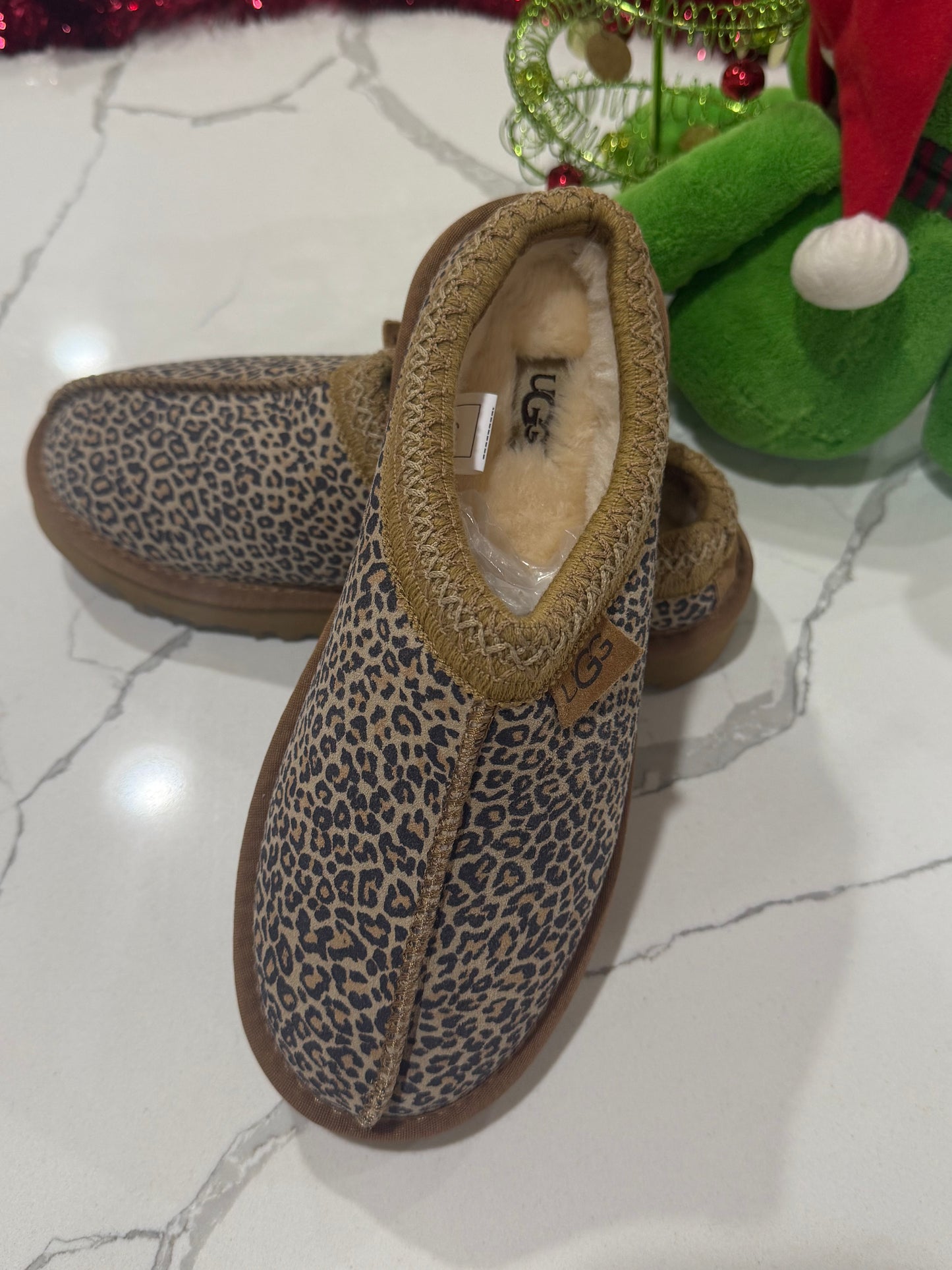 New Leopard Print UGGS size 39 (size fits more like a 7)